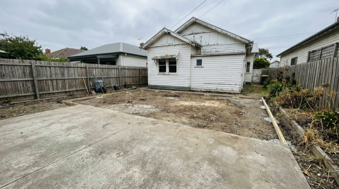 Bare yard before the deck was built