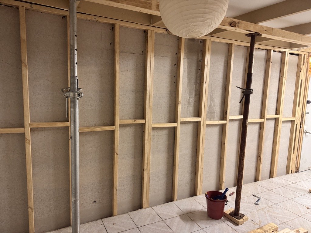 Timber stud wall framed and propped during a Melbourne structural job